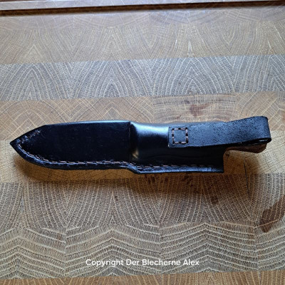 Outdoormesser mit Mammutknochen und einer Klinge aus einer 105er Haubitze des 1WK
