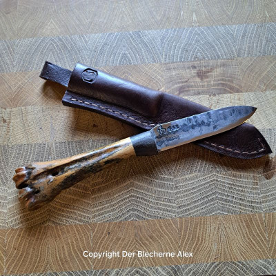 Outdoormesser mit Eiszeithirsch und Klinge aus einer PAK 3,7cm des 2WK Outdoormesser mit Eiszeithirsch und Klinge aus einer PAK 3,7cm des 2WK