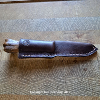 Outdoormesser Eiszeitpferdeknochen mit Klinge aus einer 105er Haubitze des 1WK